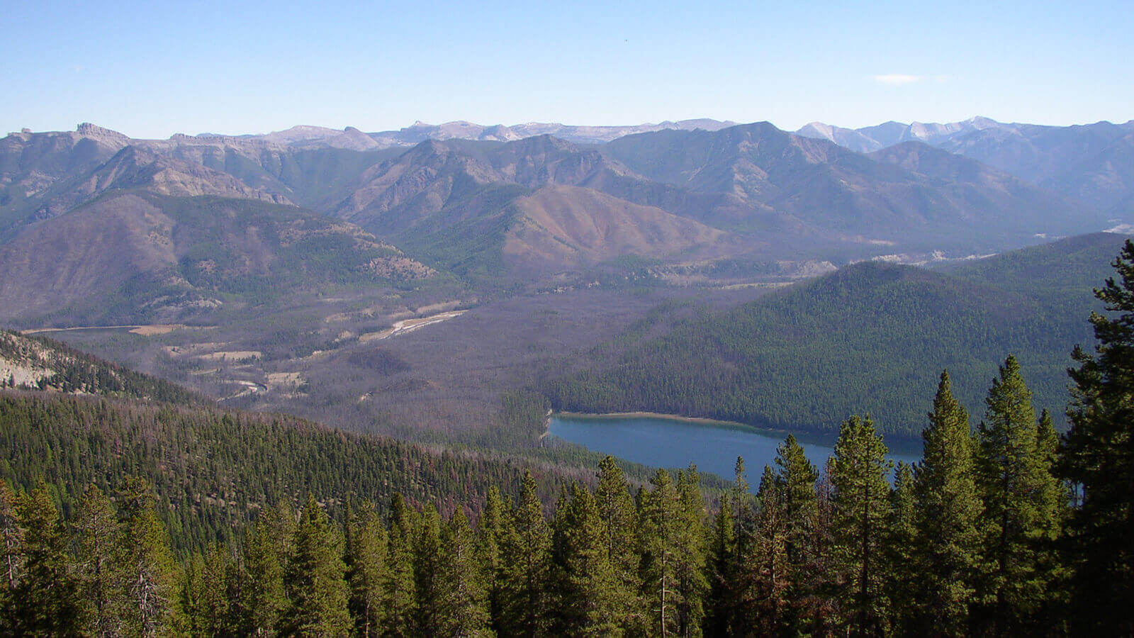 Historic fire lookout on a ridgeline in the Bob Marshall Wilderness